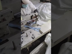 Uitstalling van details van branddekens, naaien van branddekens